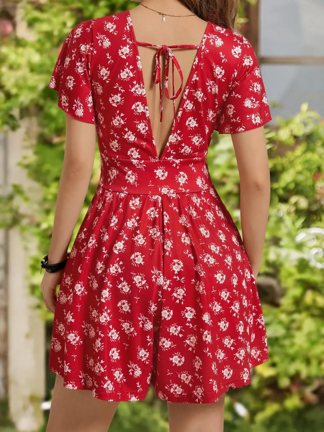 ZABERRY Women's Back Lace Up Floral Rompers with Pockets Short Ruffle Sleeve Summer Jumpsuits Wide leg Outfit